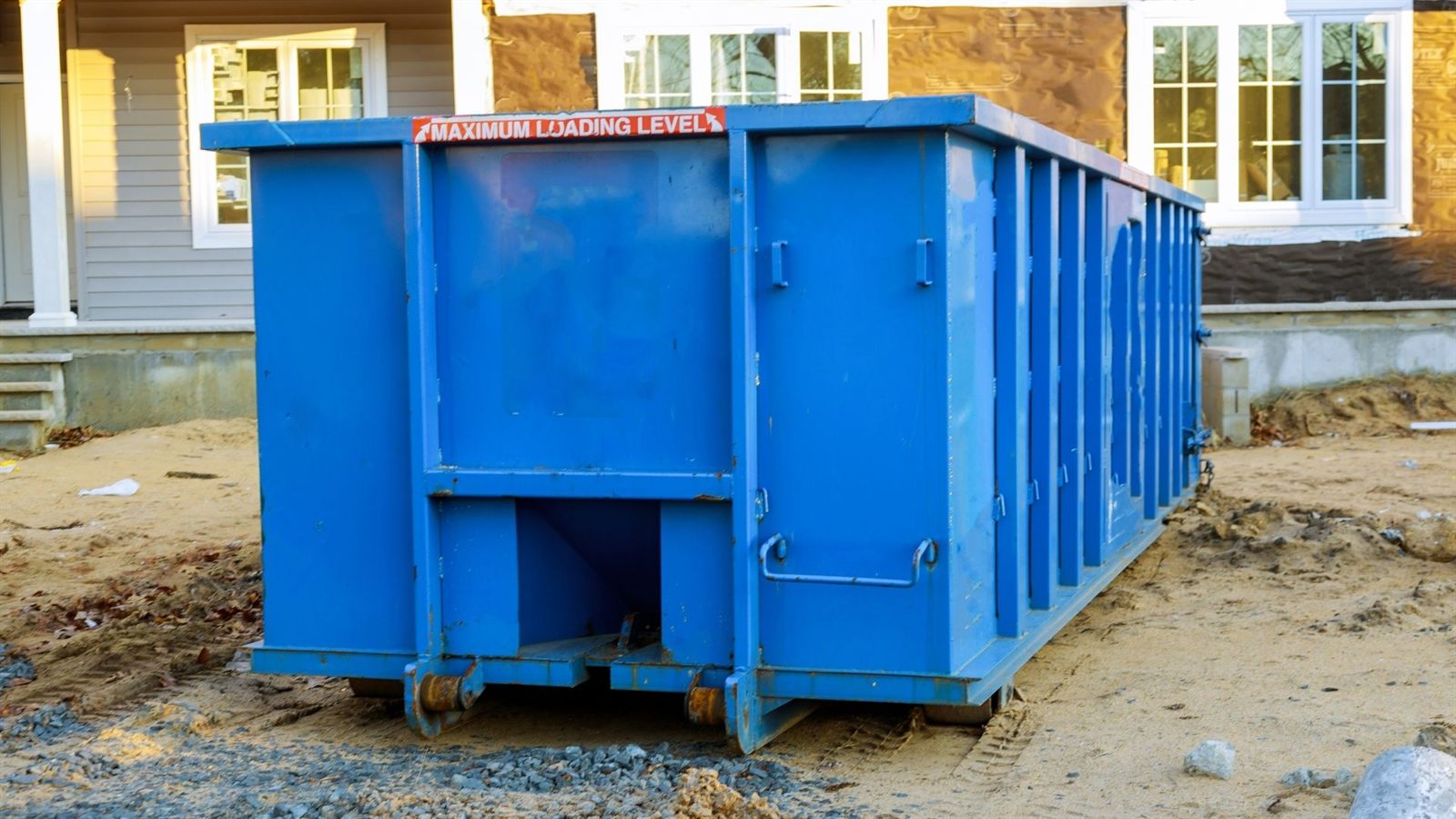 Roll off dumpster at commercial lot